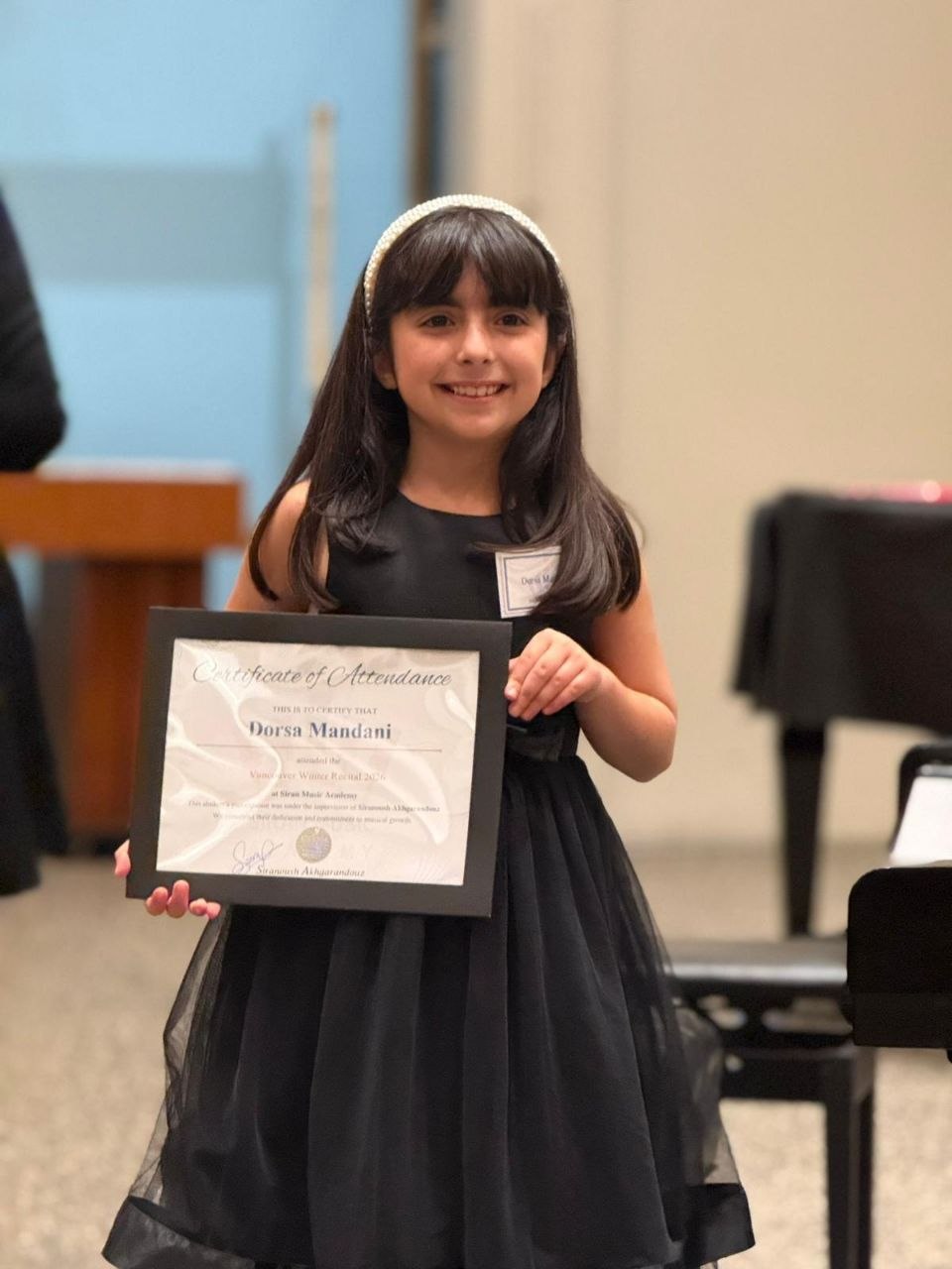 Dorsa Mandani with recital certificate
