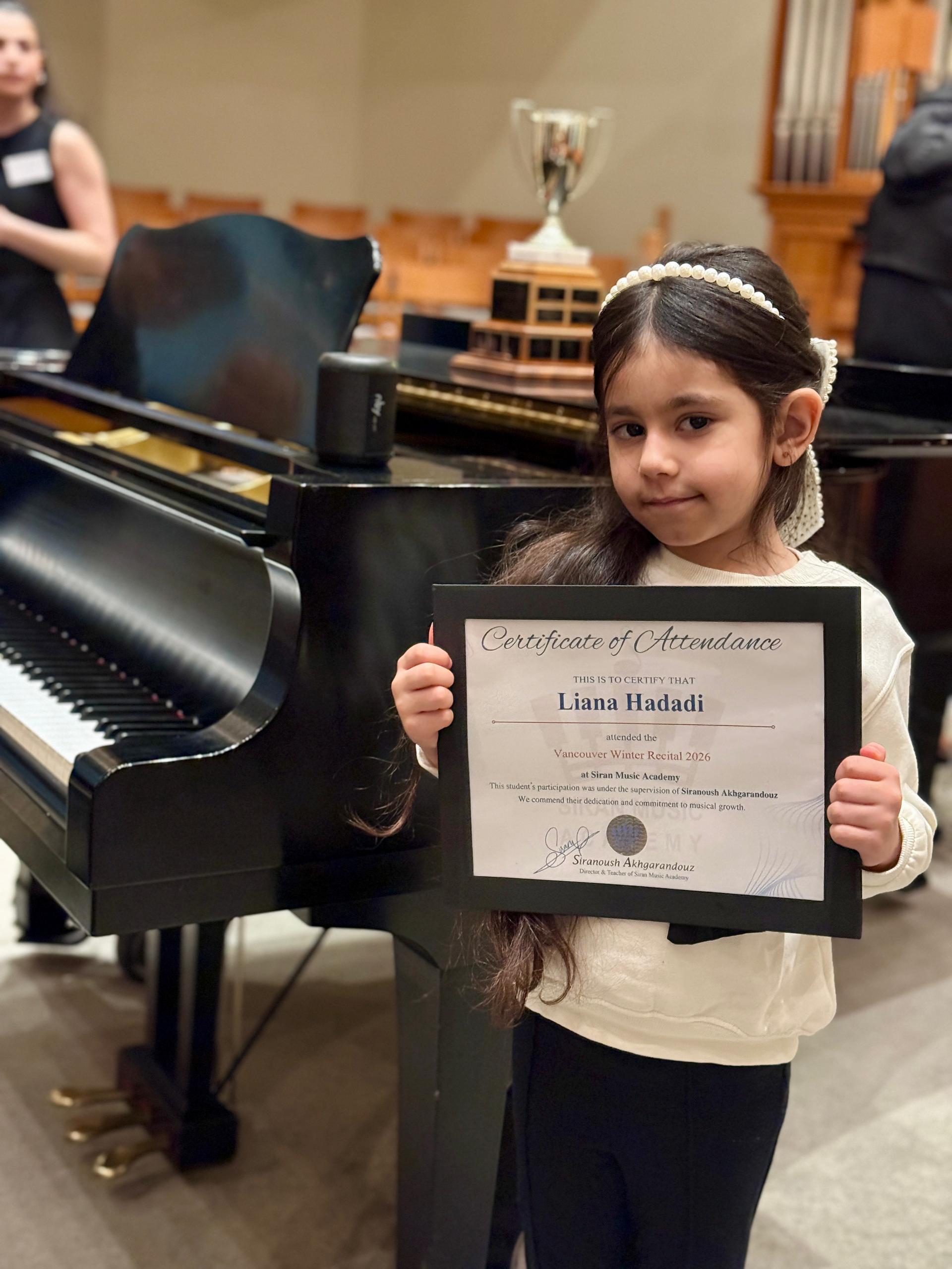 Liana Hadadi with recital certificate
